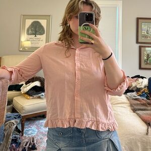 Baby pink vintage top purchased at an Amsterdam flea market size small